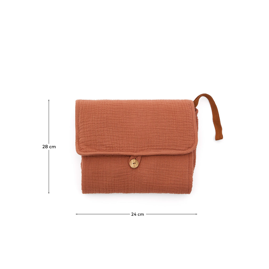 Olna travel changing mat in 100% terracotta cotton
