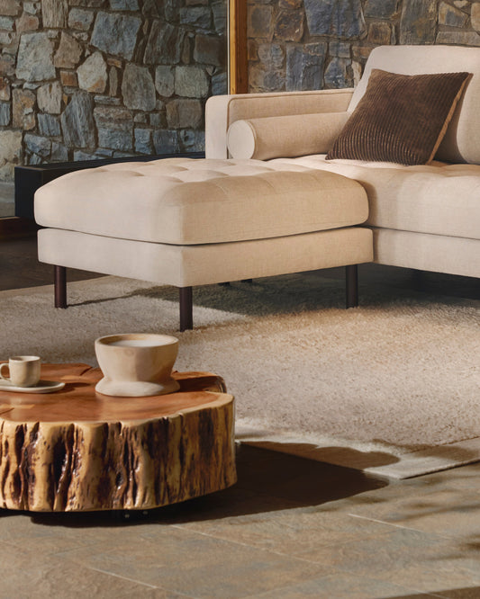 Tavine coffee table in solid acacia wood with bleached finish with wheels Ø65cm