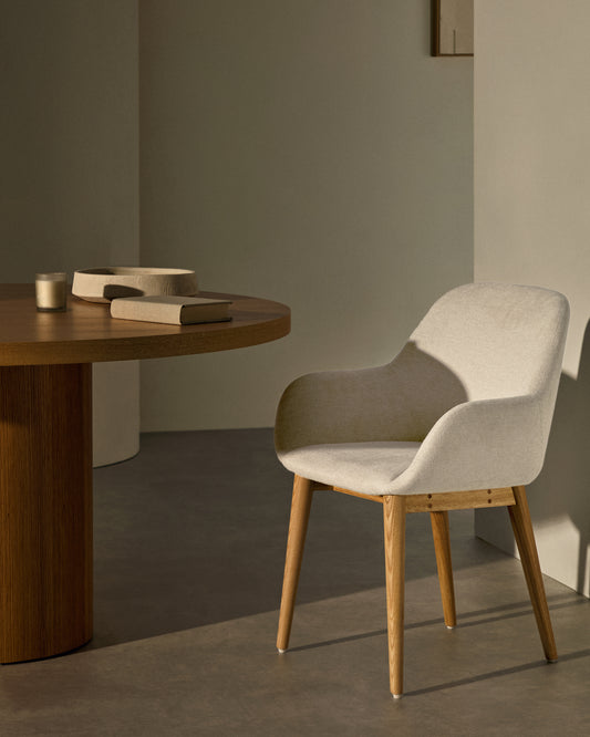 Konna chair in beige with solid ash wood legs in a natural finish