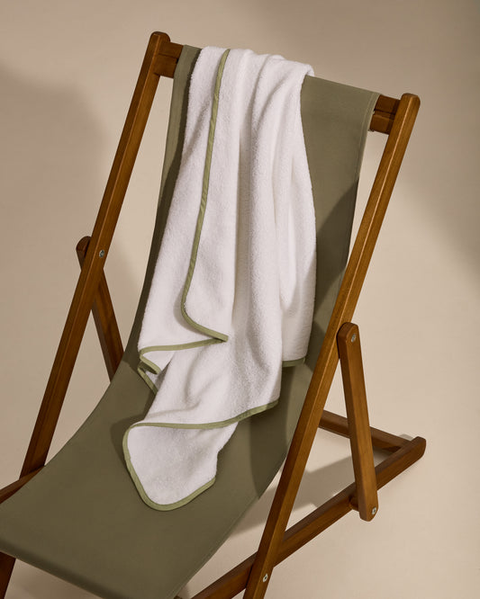 White cotton Nuni hooded towel with a green trim