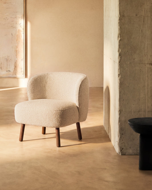 Ulit armchair in white bouclé with solid ash wood legs in a walnut finish