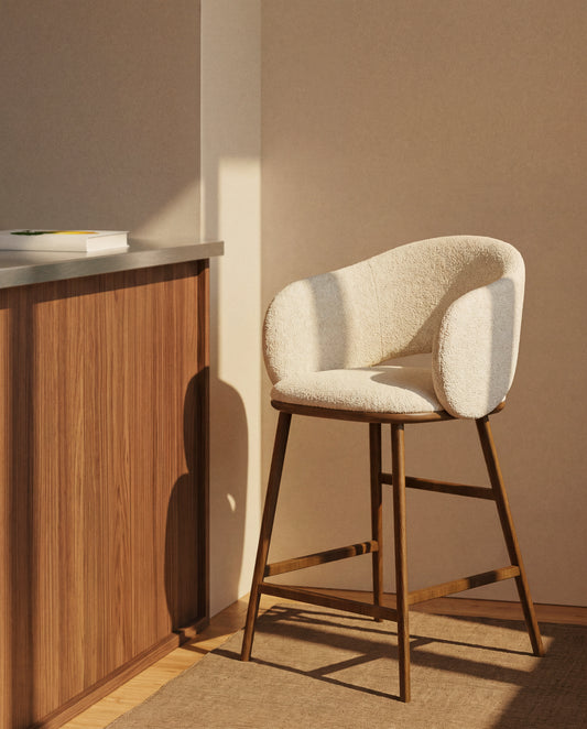 Maina stool in thick beige chenille with solid ash wood legs and a walnut-tone finish, FSC Mix Credit 65 cm