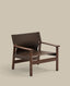 Jan armchair made of dark brown recycled leather fibres and FSC 100% solid ash wood with walnut-coloured finish