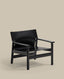 Jan armchair made of black recycled leather fibres and FSC 100% solid ash wood with black finish