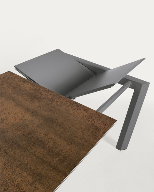 Axis extendable porcelain table with Iron Corten finish and dark grey legs, 120 (180) cm