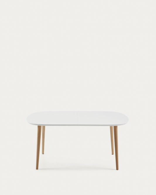 Oqui extendable oval table with an oak veneer and solid wood legs, Ø 160 (260) x 100 cm