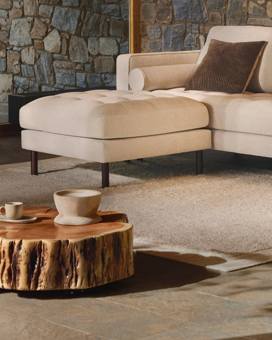 Tavine coffee table in solid acacia wood with bleached finish with wheels Ø65cm