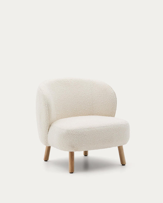 Ulit armchair in white bouclé with solid beech wood legs in a natural finish