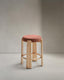 Granite stool in terracotta chenille and solid ash wood with a natural tone finish FSC 100% 65cm