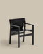 Jan chair made of black recycled leather fibres and FSC 100% solid ash wood with black finish