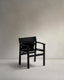 Jan chair made of black recycled leather fibres and FSC 100% solid ash wood with black finish