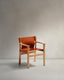 Jan chair made of light brown recycled leather fibres and FSC 100% solid ash wood with natural tone finish