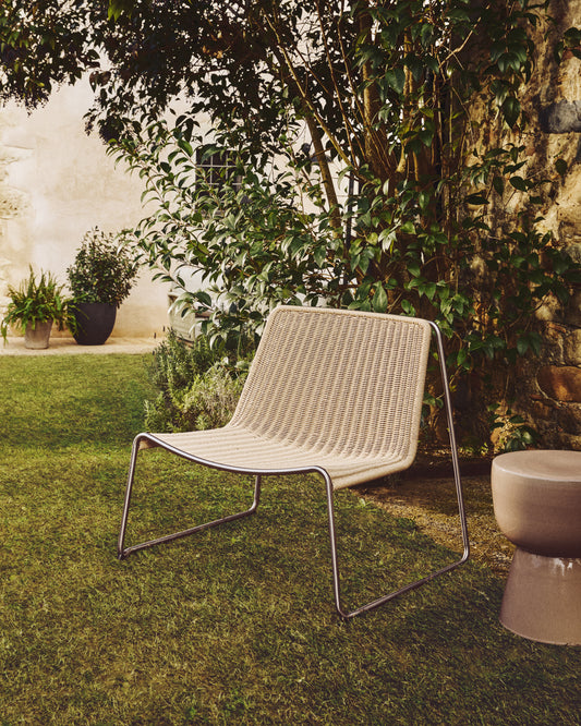 Tavari stackable armchair in beige synthetic rope cord and AISI 304 stainless steel with brushed finish