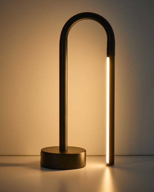 Bow black aluminium portable table lamp