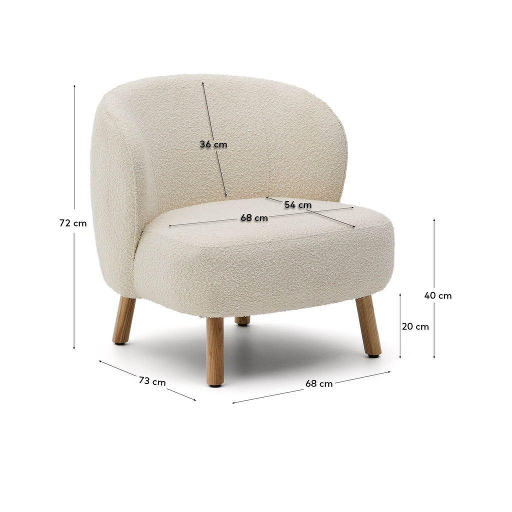Ulit armchair in white bouclé with solid beech wood legs in a natural finish