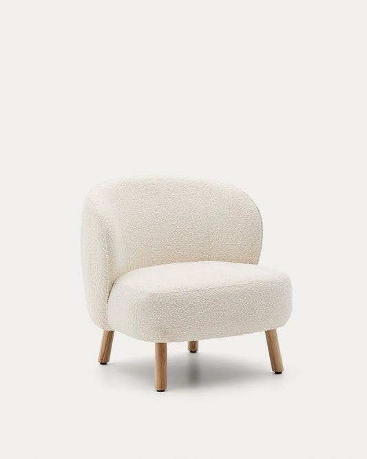 Ulit armchair in white bouclé with solid beech wood legs in a natural finish