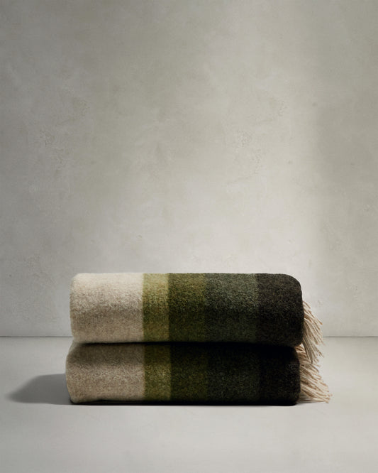 Voreni green recycled wool blanket with fringing 130 x 170cm